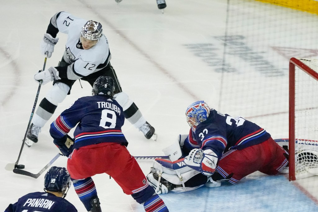 Jonathan Quick saves a shot by former teammate, Los Angeles Kings Trevor Moore earlier this season.