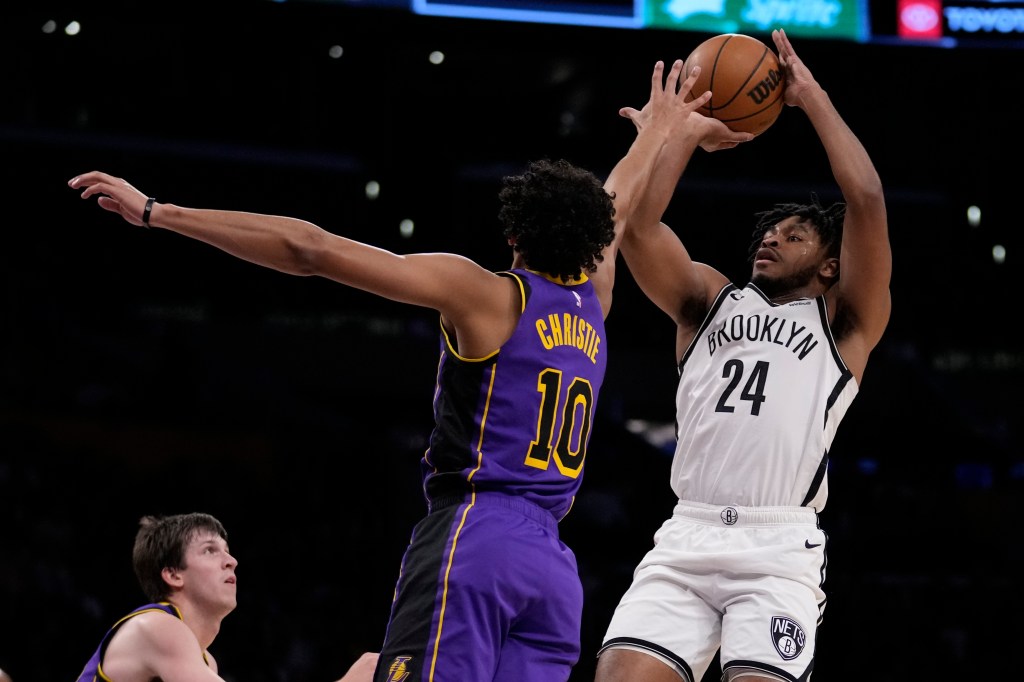 Cam Thomas, who scored a game-high 33 points, shoots over Max Christie during the Nets' 130-112 over the Lakers.