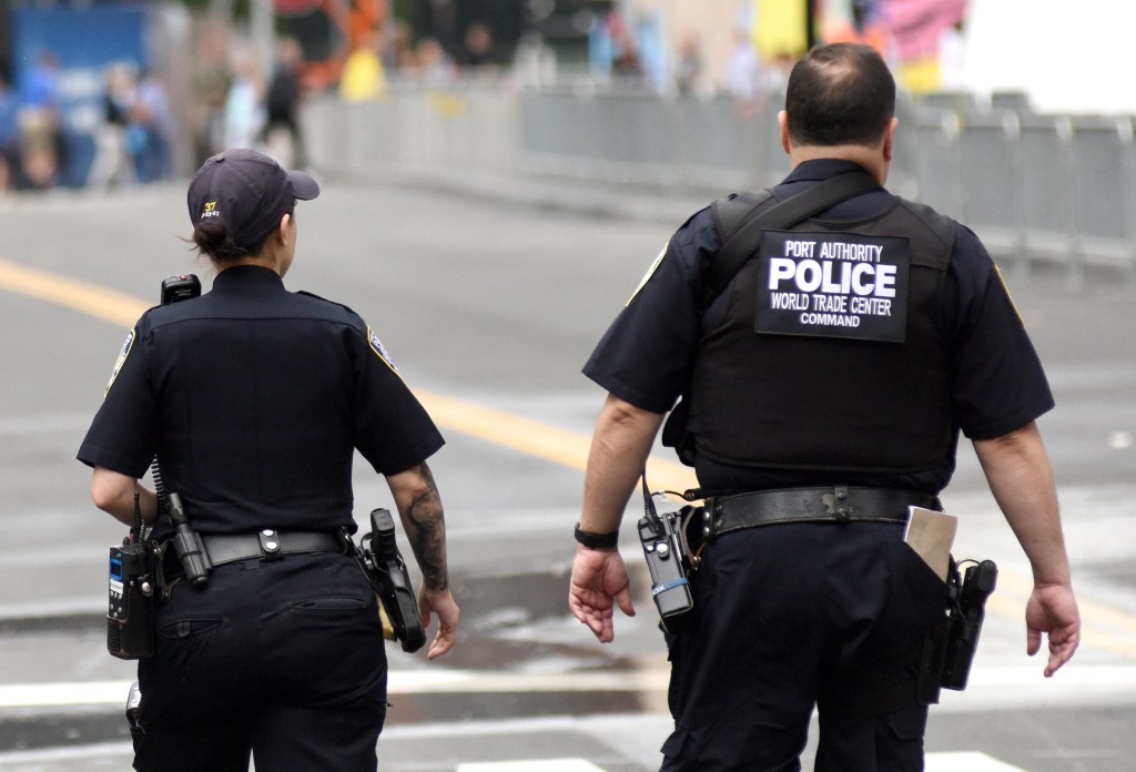 New York Police Department officers performing duties on a Manhattan street.