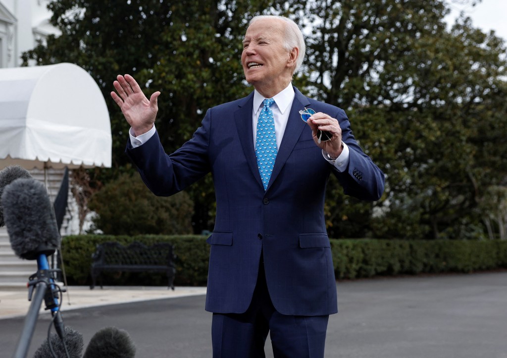 U.S. President Joe Biden speaks to the media before he departs the White House for Florida, in Washington, U.S., January 30, 2024. 