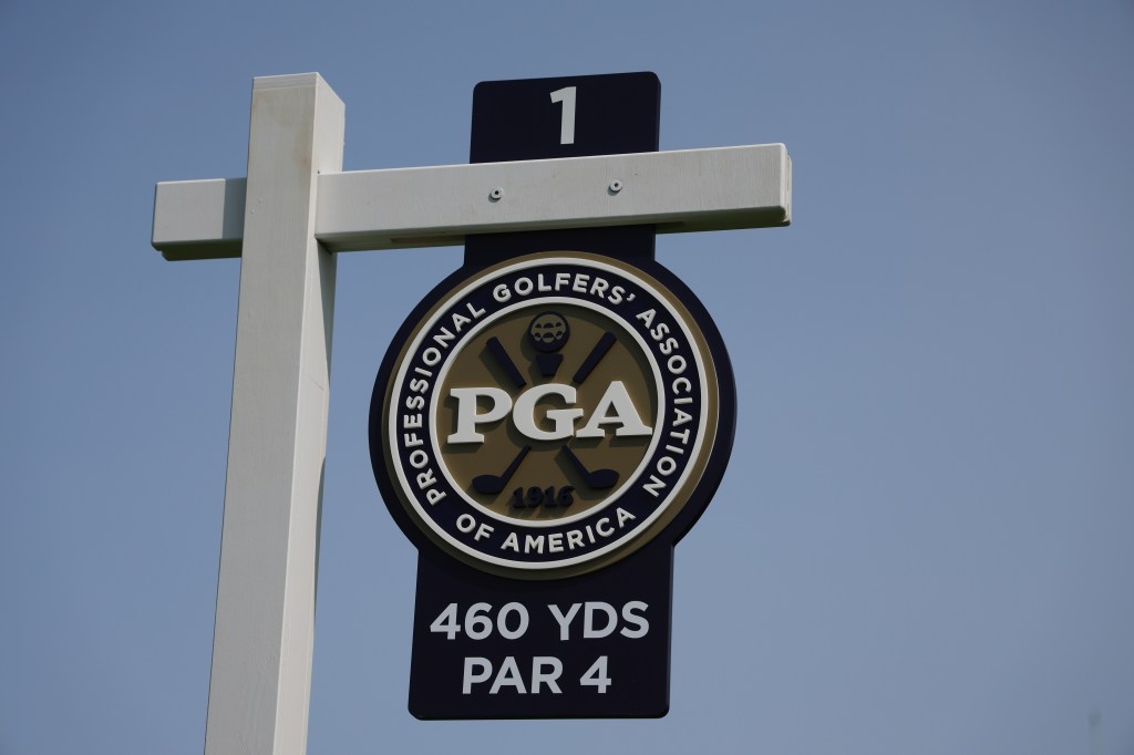  The tee sign on the first hole is seen during a practice round prior to the 2023 PGA Championship at Oak Hill Country Club