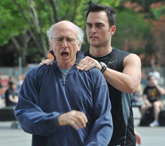 NEW YORK - JULY 02: Larry David and Cheyenne Jackson (R) on location for "Curb Your Enthusiasm" on the streets of Manhattan on July 2, 2010 in New York City. (Photo by Bobby Bank/WireImage)