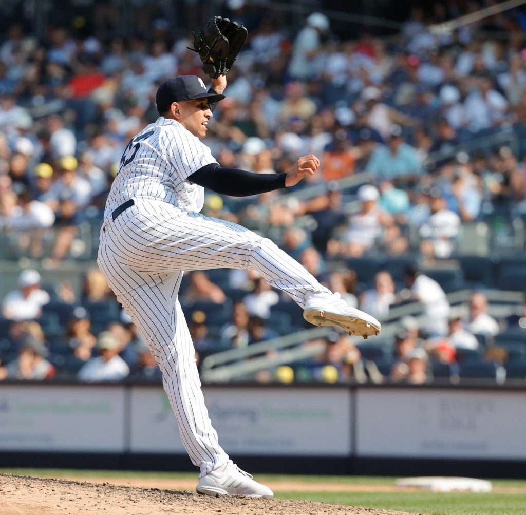 New York Yankees relief pitcher Keynan Middleton throwing to Houston Astros in 8th inning at Yankee Stadium on August 6, 2023.