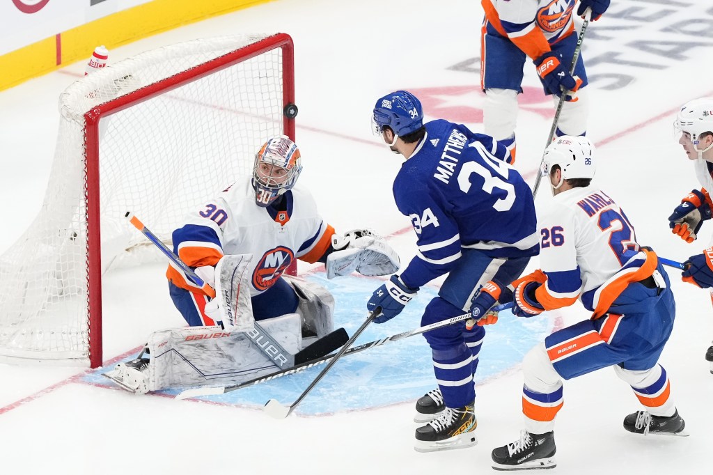 Auston Matthews shot hits the post as Ilya Sorokin defends during the Islanders' 3-2 win over the Maple Leafs.