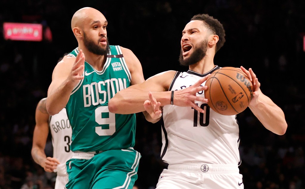 Ben Simmons, who had five points and eight assists, drives on  Derrick White during the Nets' loss.