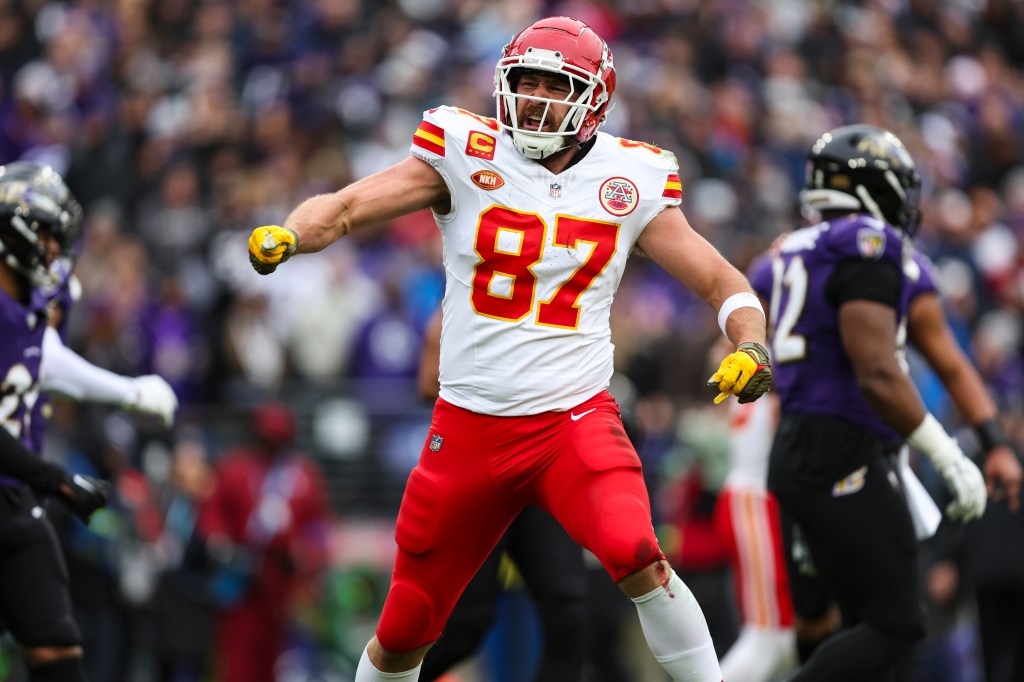 Travis Kelce #87 of the Kansas City Chiefs celebrates during the AFC Championship NFL football game against the Baltimore Ravens.