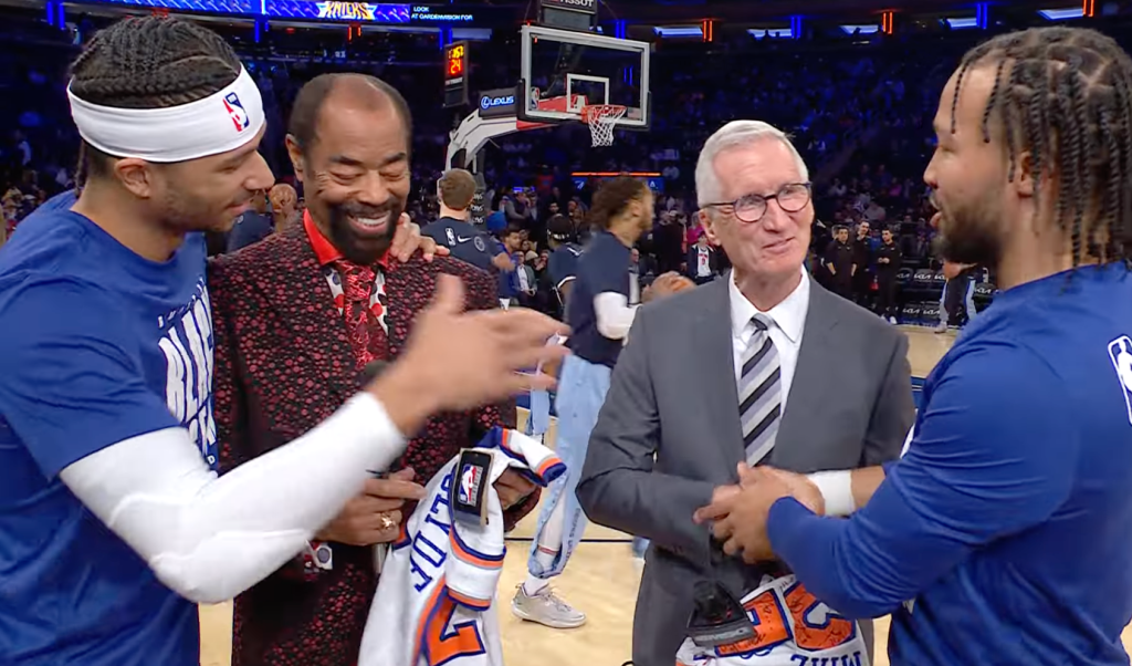 Clyde Frazier and Mike Breen were gifted jerseys for their anniversary.