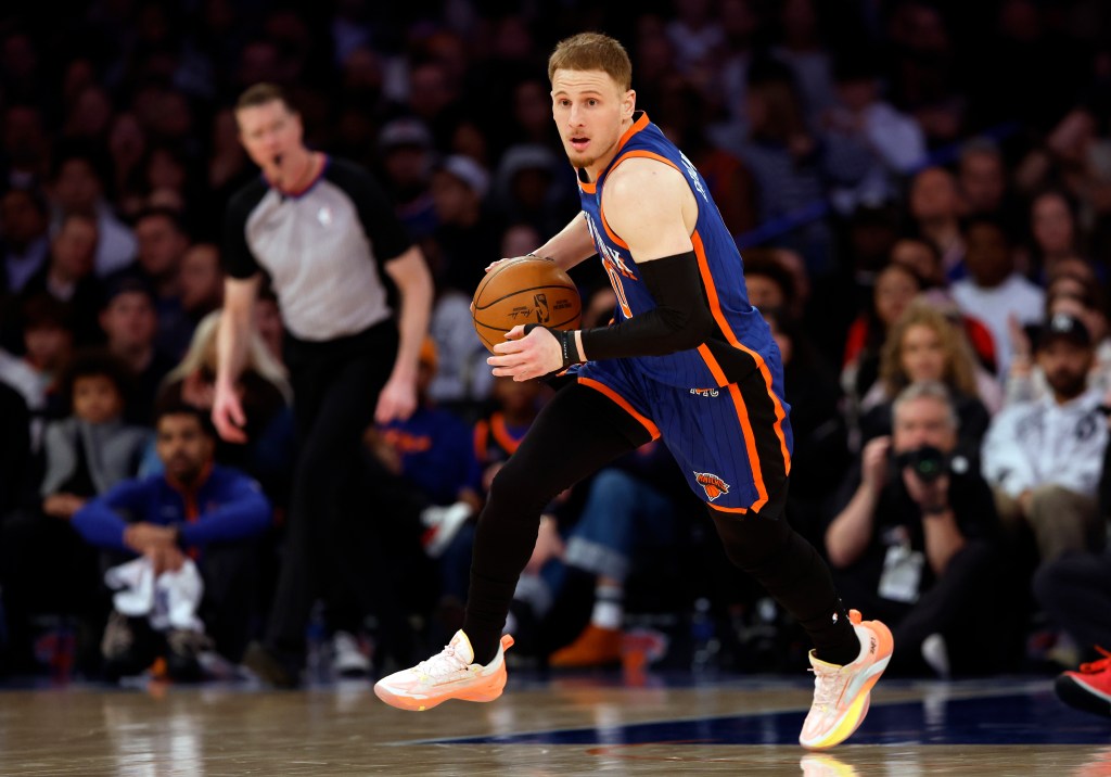 Donte DiVincenzo #0 of the New York Knicks dribbles during the first half against the Toronto Raptors.