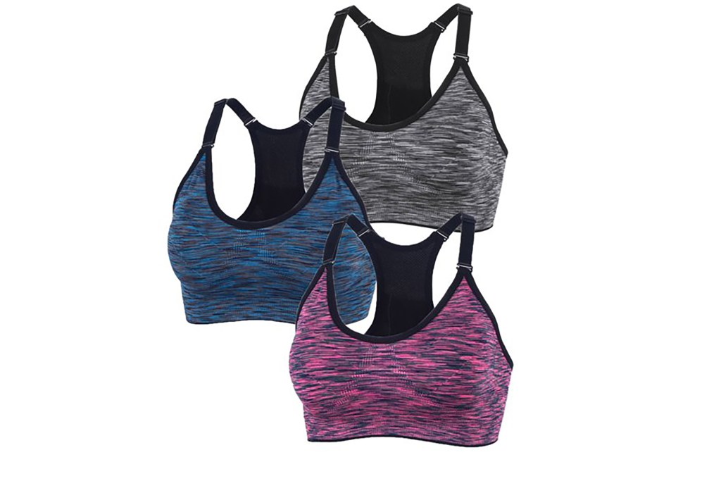 Three sports bras in blue, gray and pink