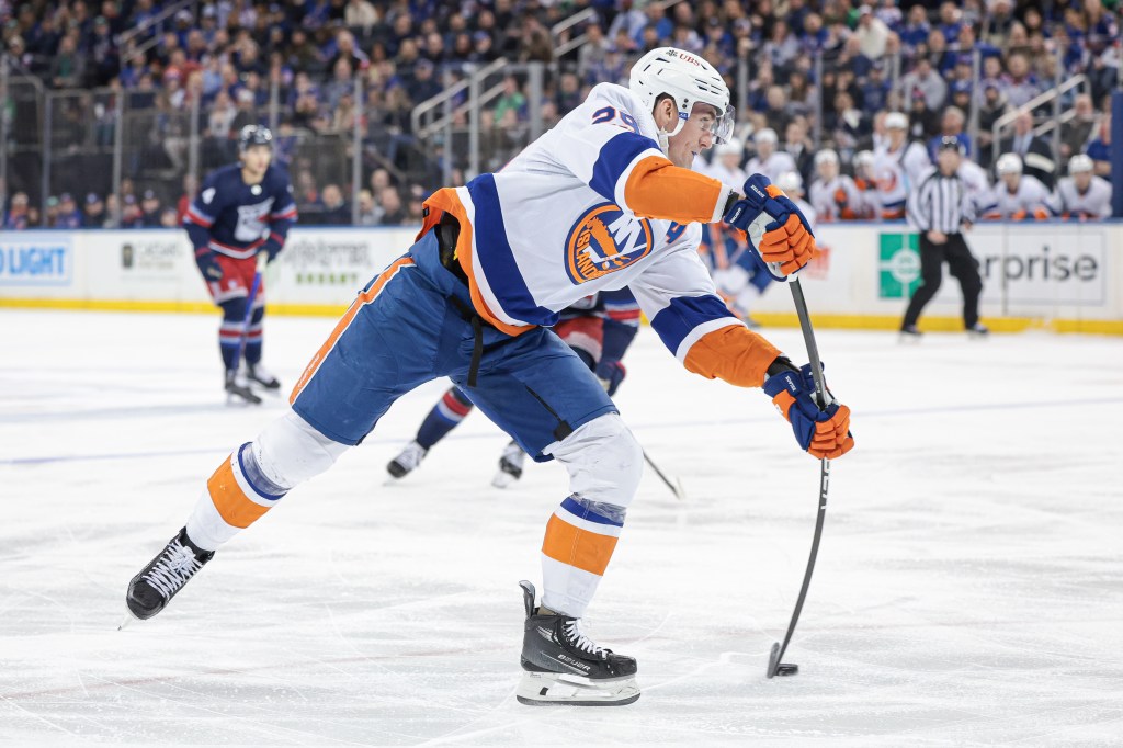 Islanders center Brock Nelson (29) shoots the puck against the New York Rangers during the first period at Madison Square Garden.