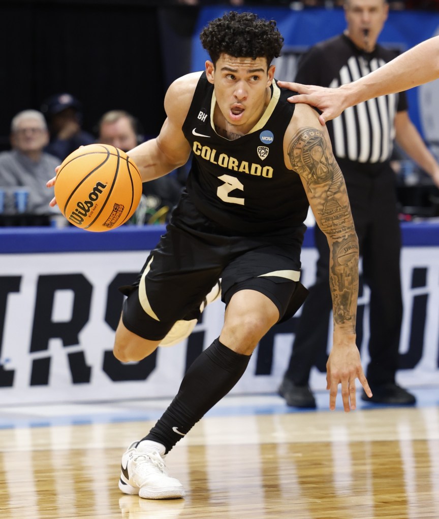 KJ Simpson drives to the basket during Colorado's win.