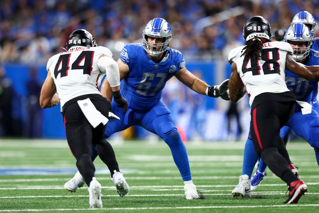 Matt Nelson #67 of the Detroit Lions blocks during an NFL football game against the Atlanta Falcons at Ford Field.