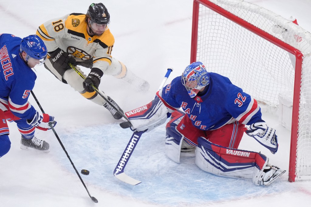 Pavel Zacha (right) is unable to score on Jonathan Quick during the Rangers' win over the Bruins.