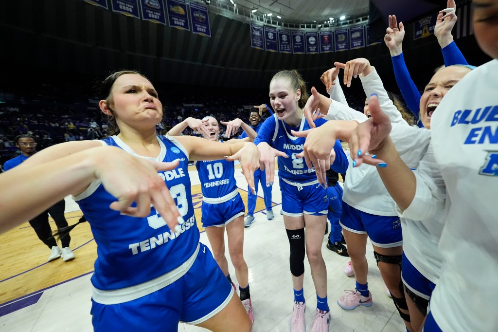 Middle Tennessee forward Courtney Whitson (33), guard Jalynn Gregory (10) and center Anastasiia Boldyreva (2) celebrate after defeating Louisville in a first-round college basketball game in the women's NCAA Tournament in Baton Rouge, La., Friday, March 22, 2024. Middle Tennessee won 71-69.