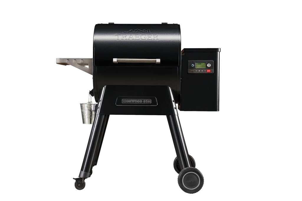 A black barbecue grill with wheels