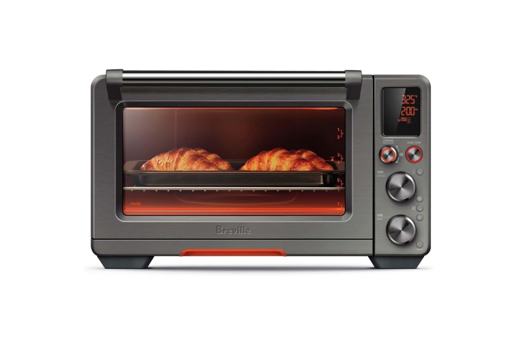 Toaster oven with two croissants.