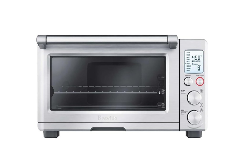 silver toaster oven with buttons and dials