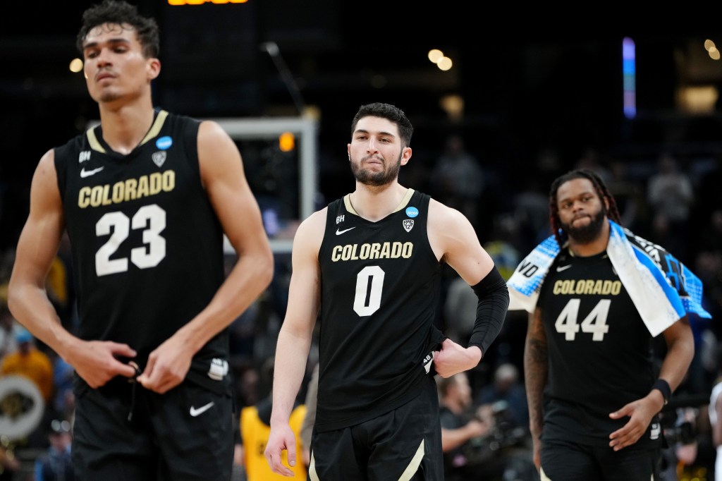 Colorado players react after their March Madness loss to Marquette on Sunday.