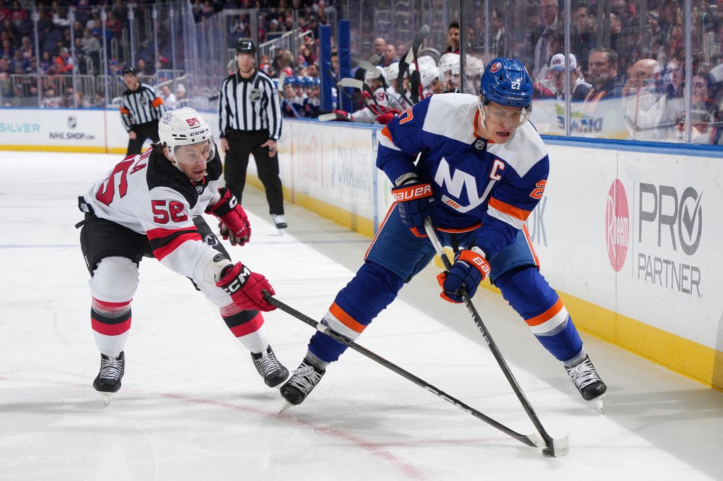 Anders Lee, pictured earlier in Sunday's game, was ejected for his knee-to-knee hit in the second period.