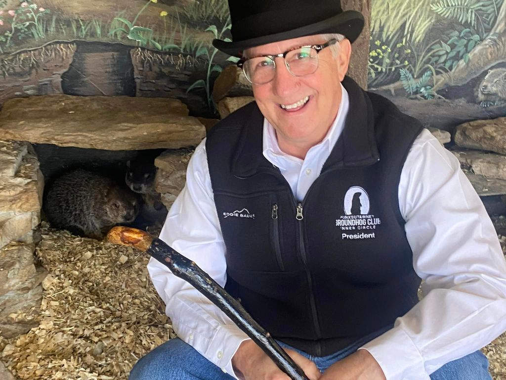 Groundhog Inner Circle Club President Tom Dunkel poses with the new family.