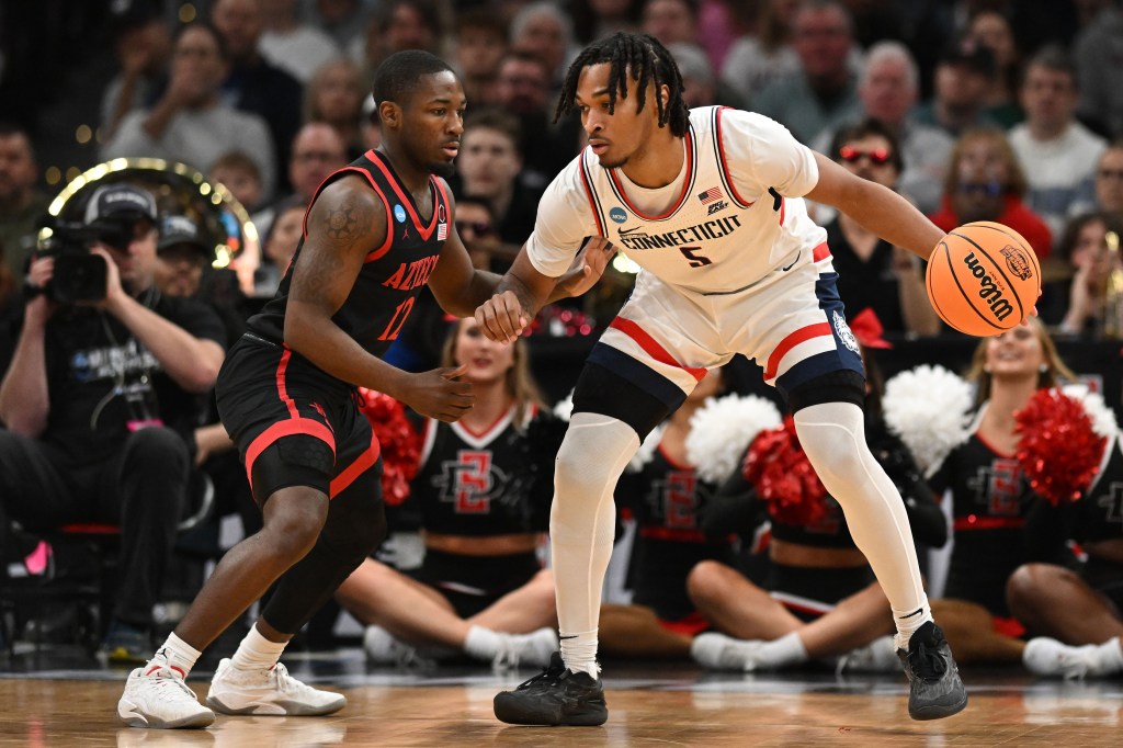 Stephon Castle looks to make a move on Darrion Trammell during UConn's Sweet 16 win.