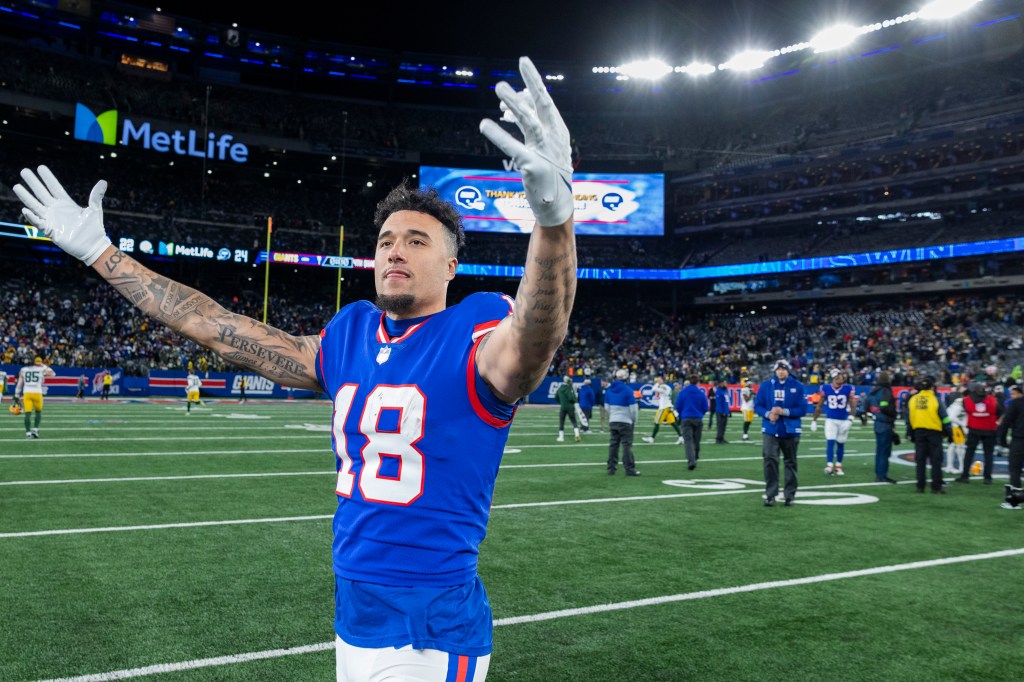 Giants wide receiver Isaiah Hodgins (18) celebrates after beating the Green Bay Packers at MetLife Stadium.