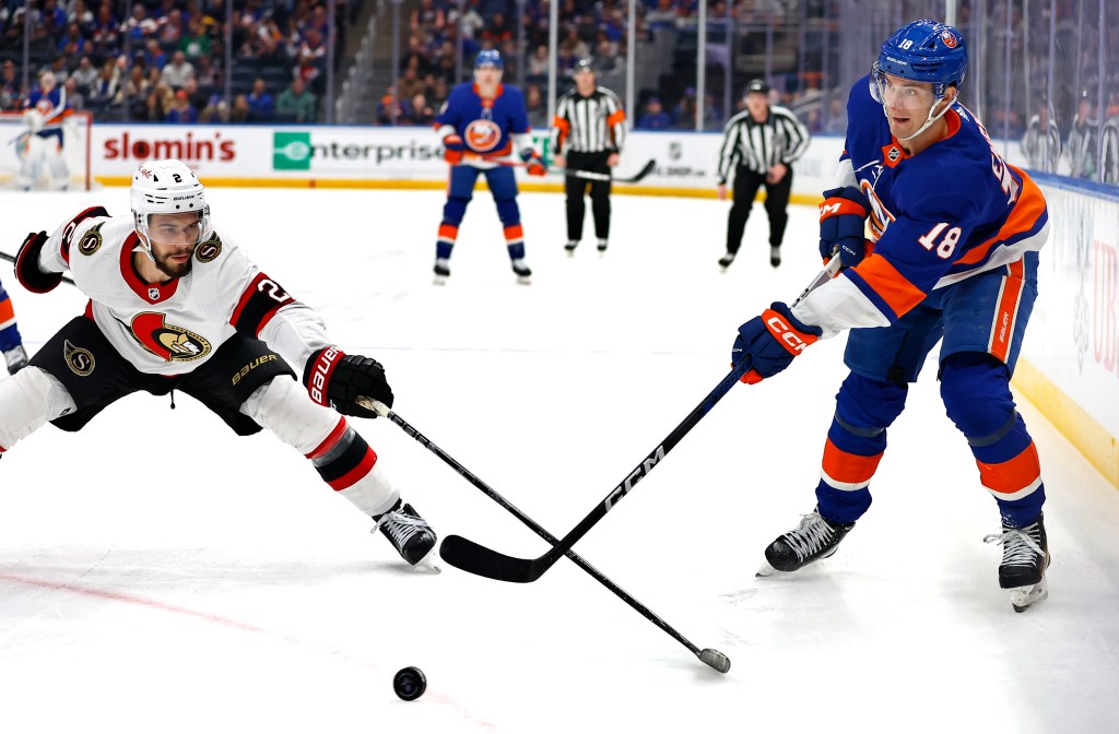 Pierre Engvall, playing the puck up the ice during a recent game against the Senators, was a healthy scratch in the Islanders' 3-1 loss to the Hurricanes.