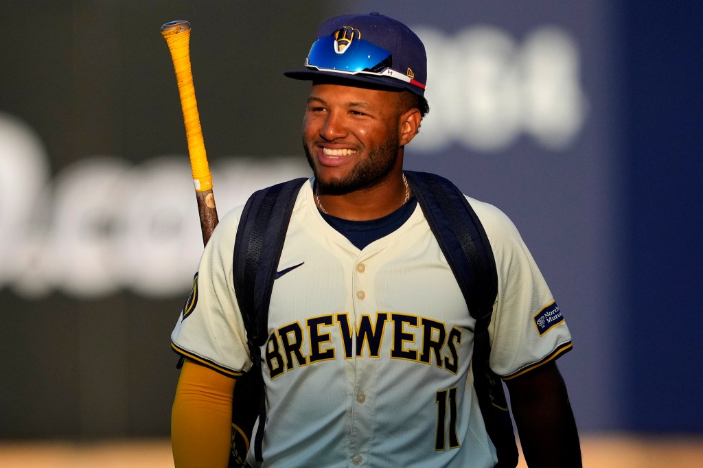 Milwaukee Brewers'' Jackson Chourio arrives prior to a spring training baseball game against the San Francisco Giants.