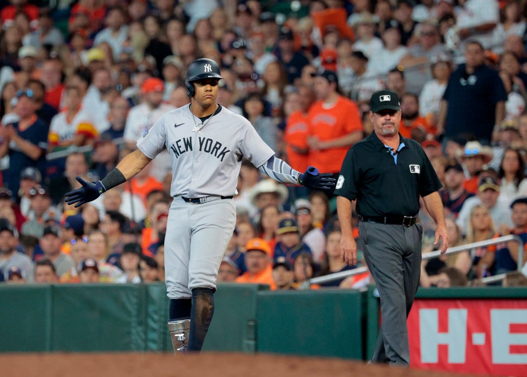 Juan Soto #22 of the New York Yankees reacts after he hits an RBI single during the fifth inning.