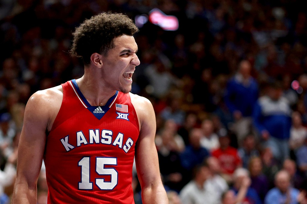   Kevin McCullar Jr. #15 of the Kansas Jayhawks reacts after drawing a foul during the 2nd half of the game against the Kansas State Wildcats at Allen Fieldhouse on March 05, 2024