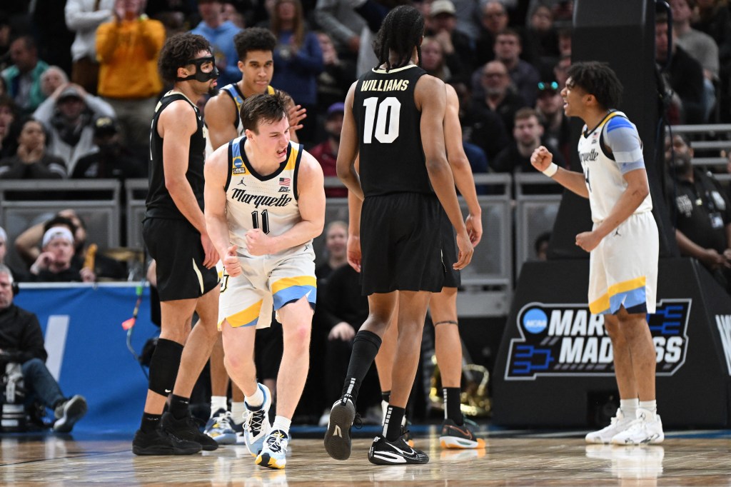 Marquette Golden Eagles guard Tyler Kolek (11) reacts during the second half against the Colorado Buffaloes on Sunday.