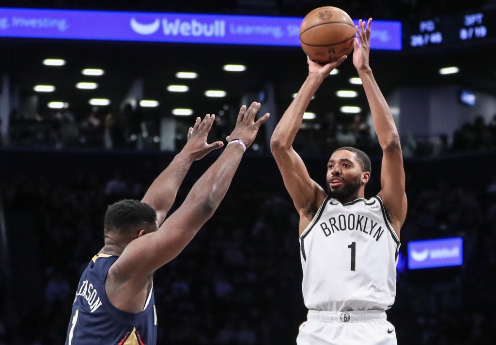 Mikal Bridges shoots a jumper over Zion Williamson during the Nets' 104-91 loss to Pelicans.