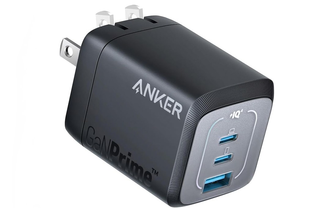 A black Anker power adapter on a white background