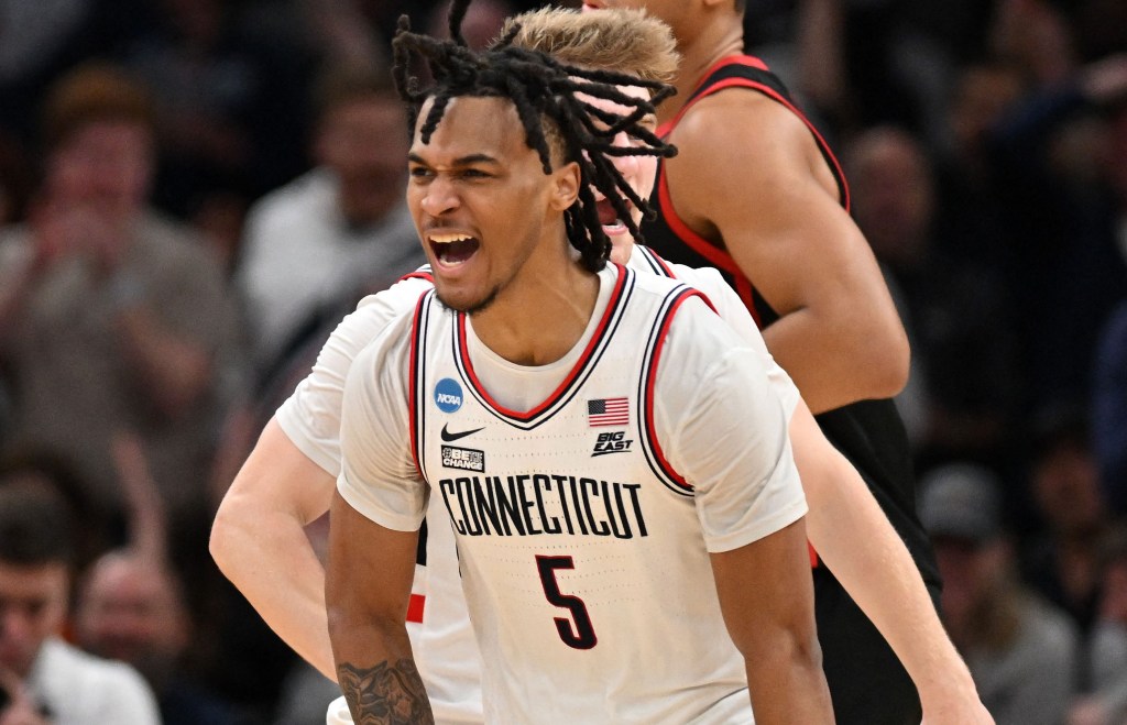 Stephon Castle, who scored 16 points and grabbed 11 rebounds, celebrates during UConn's 82-52 blowout Sweet 16 win over San Diego State.