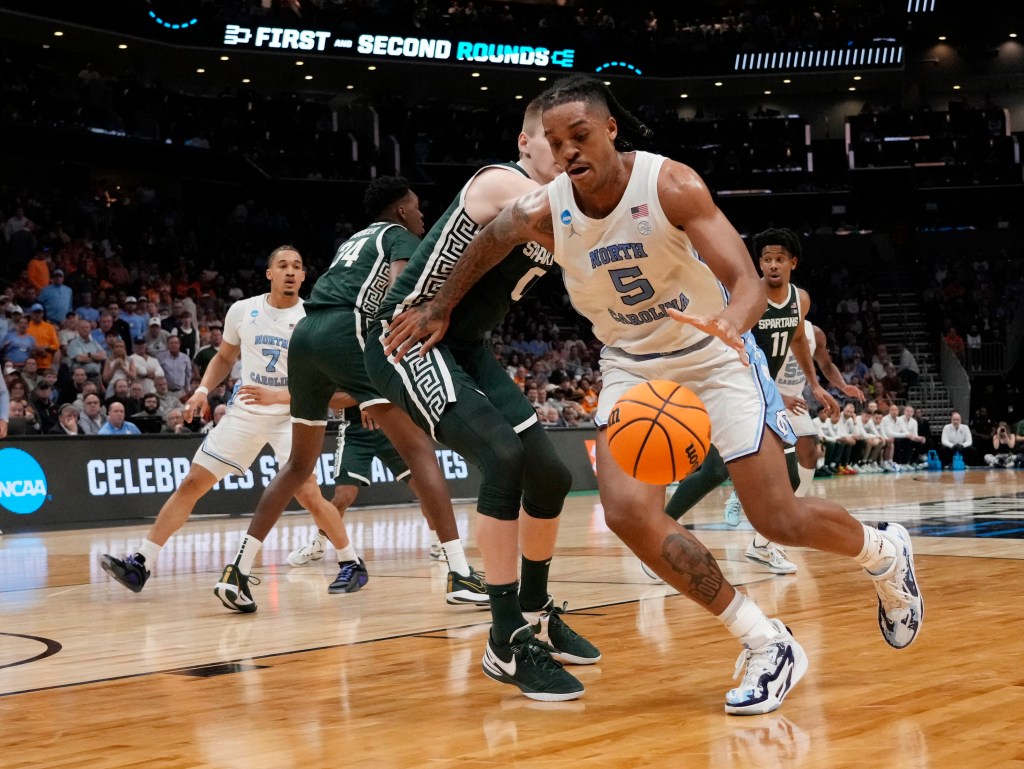 UNC's Armando Bacot dribbles during a March Madness game against Michigan State on March 23, 2024.