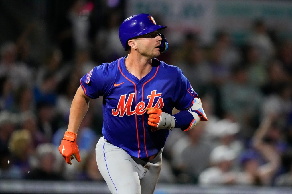 Pete Alonso #20 of the New York Mets looks on during a spring training game against the Miami Marlins.