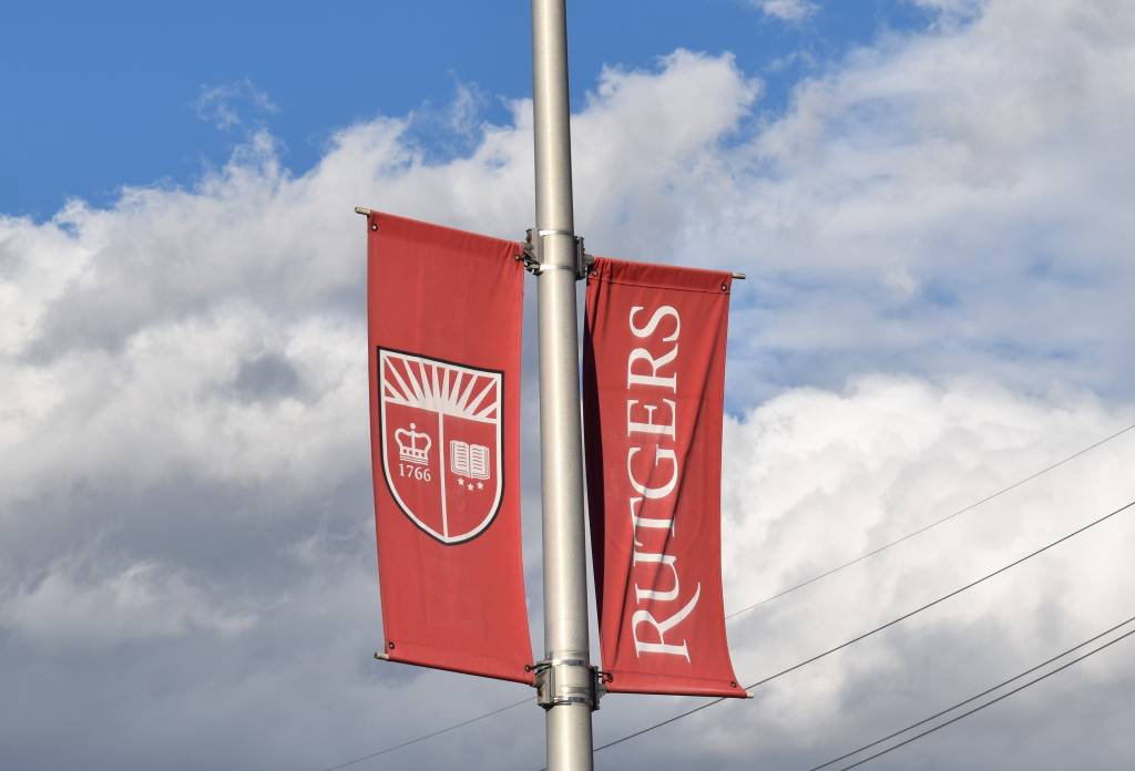 A banner flies over the campus of Rutgers University-Camden.