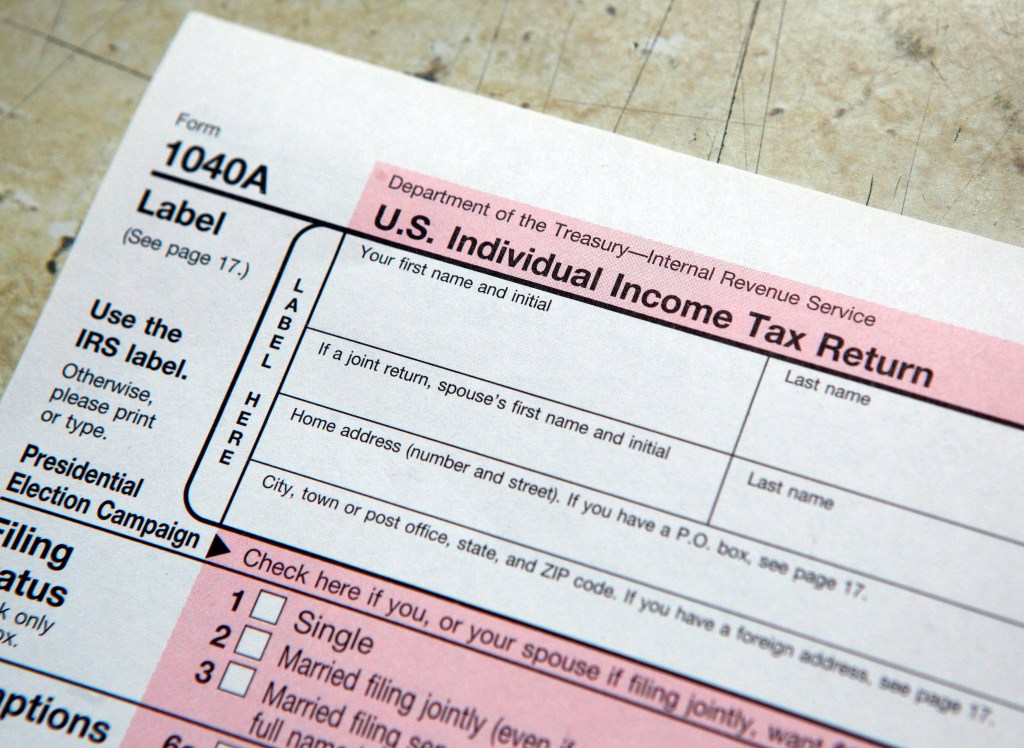 A tax form is pictured on tax deadline day at the main Post Office in New York on April 15, 2009.