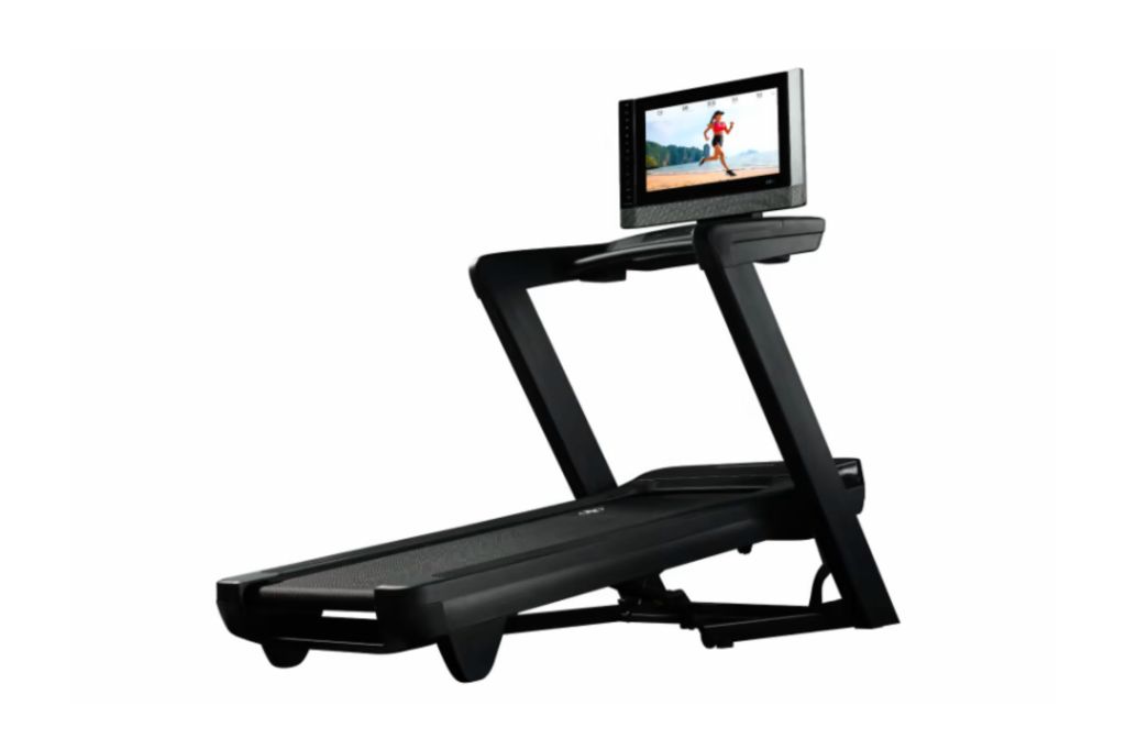 Large treadmill on incline with large TV screen.