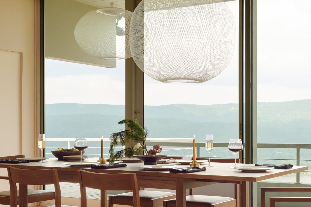 huge chandelier over dining table