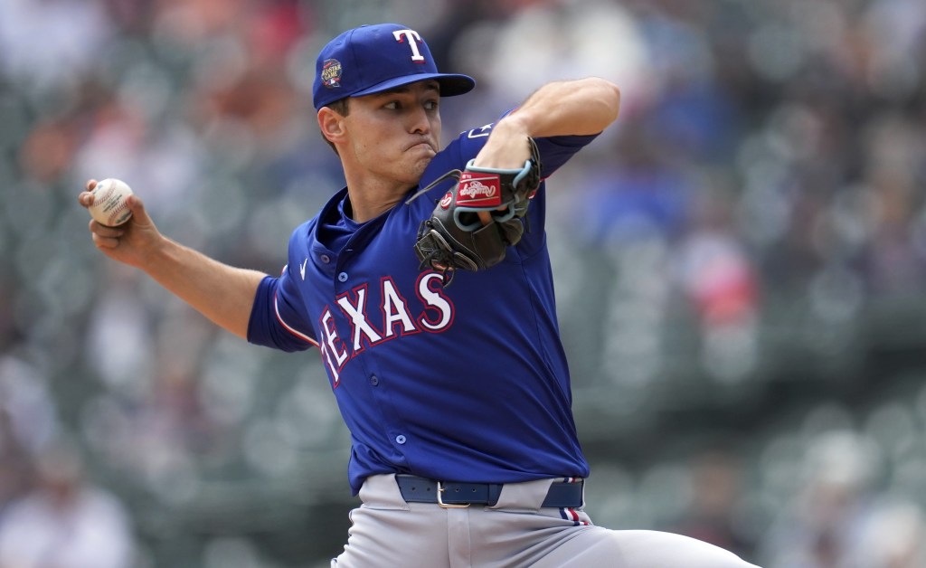 Jack Leiter delivers a pitch during the third inning of the Rangers' win.