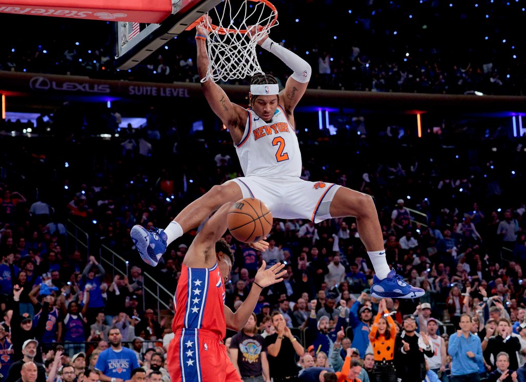 Miles McBride slams home a dunk during the Knicks' victory.