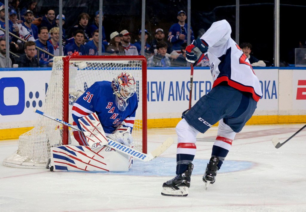 Igor Shesterkin makes a save during the Rangers' Game 1 win over the Capitals on April 21, 2024. 