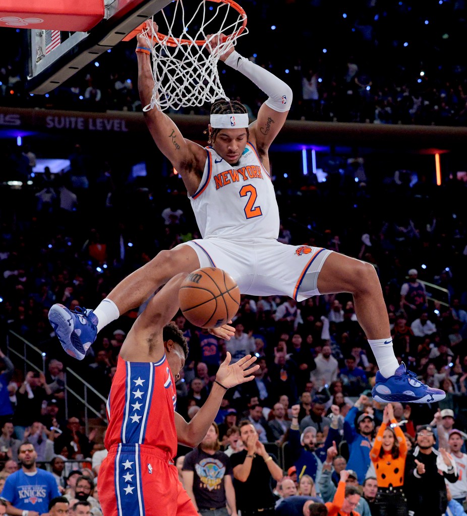 Miles McBride dunks during the Knicks' Game 1 win over the 76ers on April 21, 2024. 