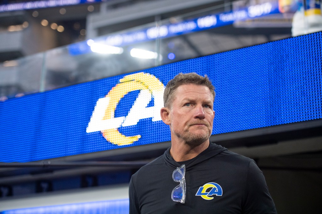 Los Angeles Rams general manager Les Snead walks on the field before an NFL football game against the Tennessee Titans Sunday, Nov. 7, 2021, in Inglewood, Calif.