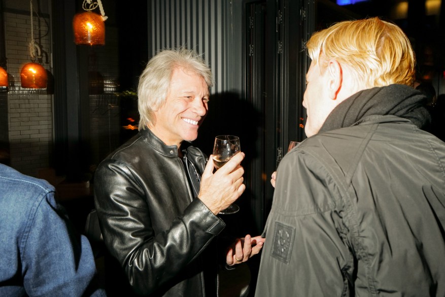 JERSEY SHORE THING: Jon Bon Jovi (left) toasts his Hulu docuseries “Thank You, Goodnight: The Bon Jovi Story” at one of many stops on his press tour.JERSEY SHORE THING: Jon Bon Jovi (left) toasts his Hulu docuseries “Thank You, Goodnight: The Bon Jovi Story” at one of many stops on his press tour.