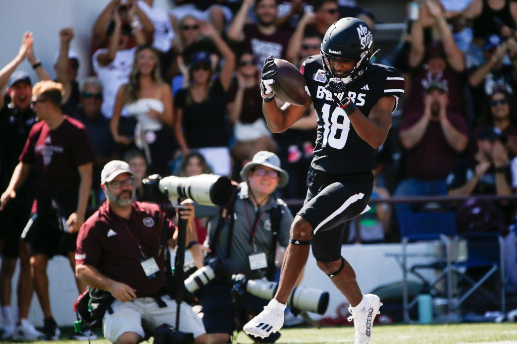 Terique Owens scores a touchdown against Utah Tech during a September 2023 game.