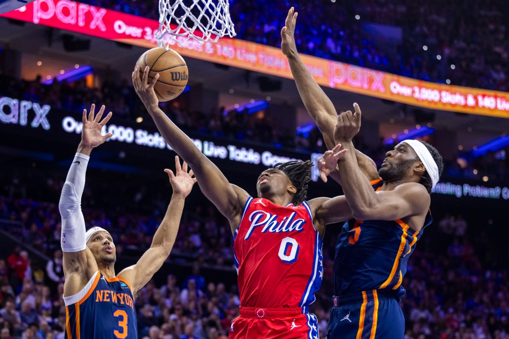 Precious Achiuwa (R.) contests a shot during the Knicks' Game 4 win over the 76ers on April 28, 2024. 