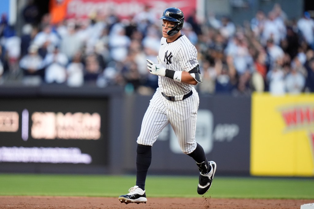 New York Yankees' Aaron Judge runs the bases after hitting a two-run home run during the first inning of a baseball game against the Oakland Athletics