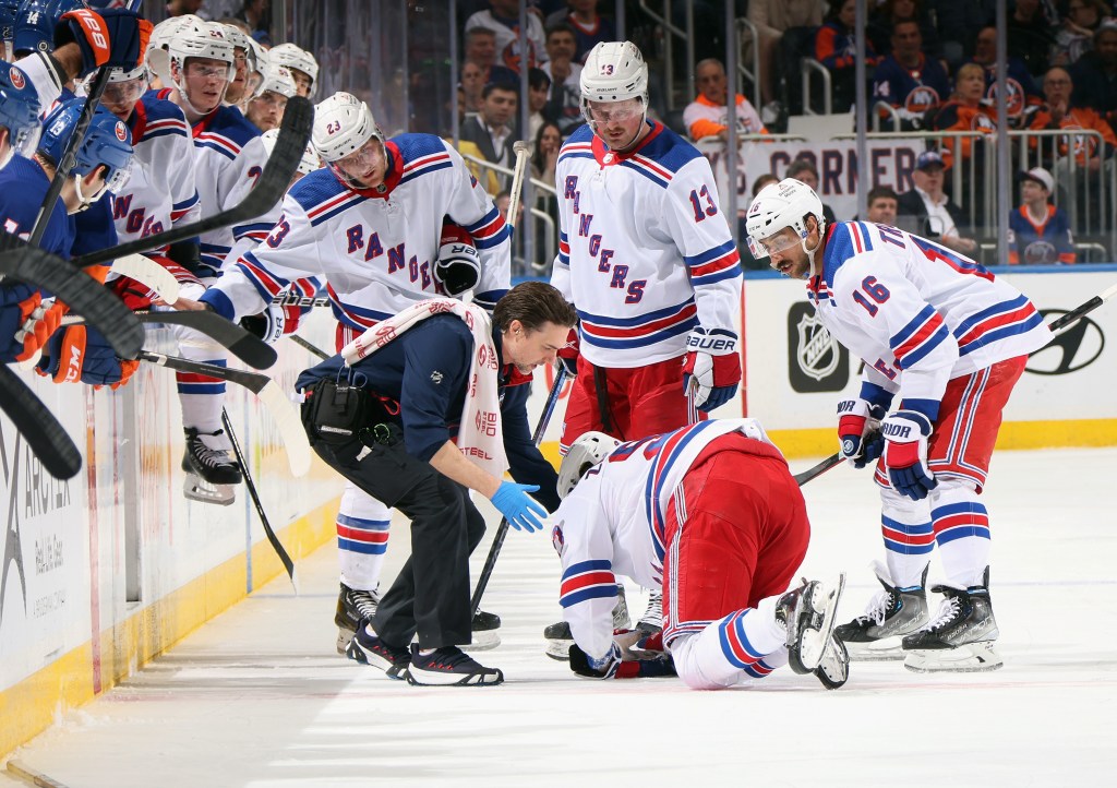 Mika Zibanejad is injured after a third-period collision with Adam Pelech during the Islanders' 4-2 win over the Rangers. Zibanejad returned to the bench later in the game.